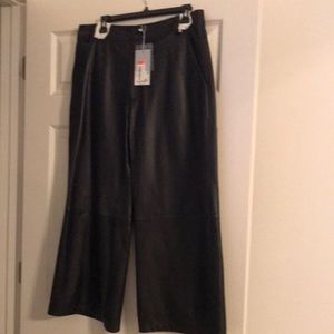 Leather crop flare leg pants.
